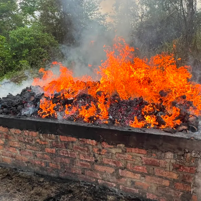 Open brick kiln during carbonization