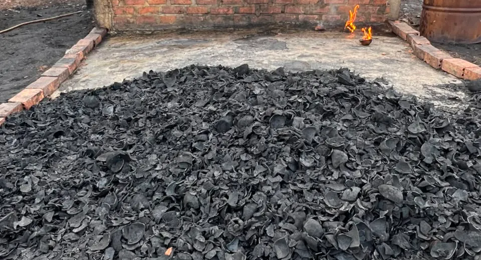 Freshly carbonized charcoal inspected for color and completeness