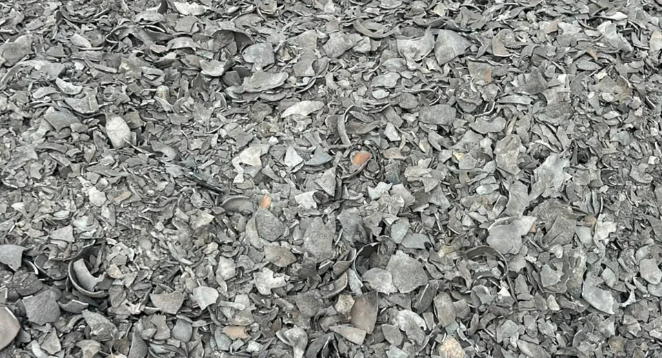 Charcoal drying on tarpaulin before screening